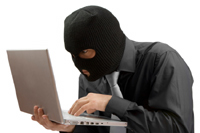 Thief at laptop
